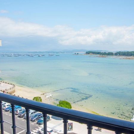 O Grove Centro Con Vistas A La Toja Parkingアパートメント エクステリア 写真